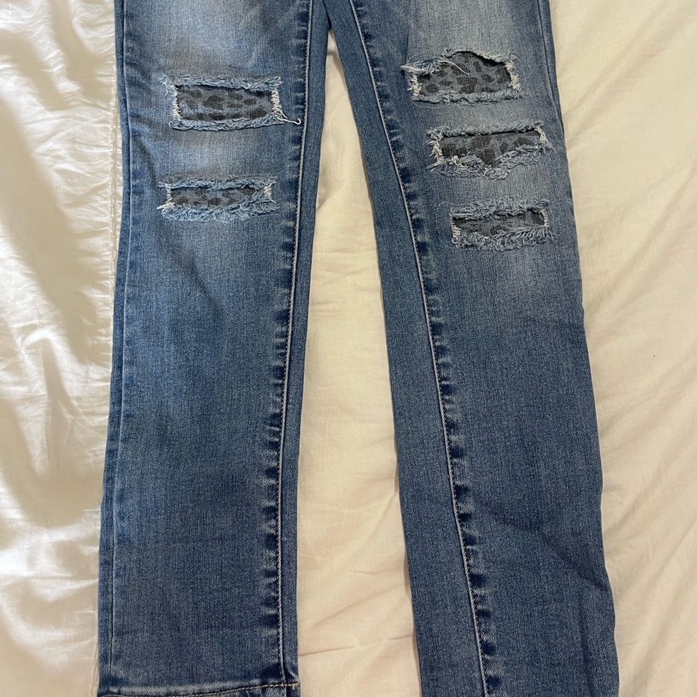 Distressed Blue Denim Jeans
